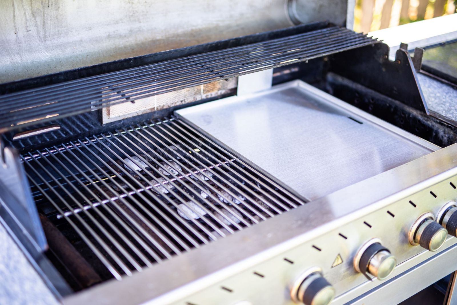 This is an image of a new Stainless_steel_ hotplate_grill in a bbq
